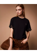 camiseta con bordado floral