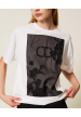 camiseta over con bordado floral