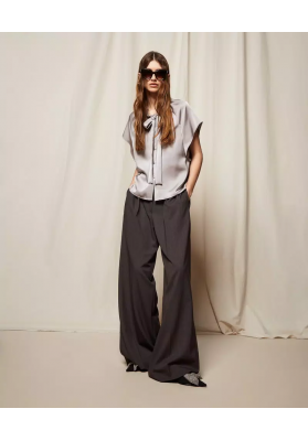 pantalon palazzo con pliegues