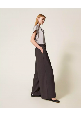 pantalon palazzo con pliegues