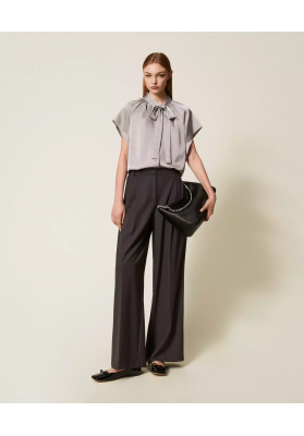 pantalon palazzo con pliegues