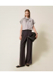 pantalon palazzo con pliegues