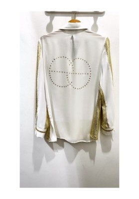 camisa dorada Privee