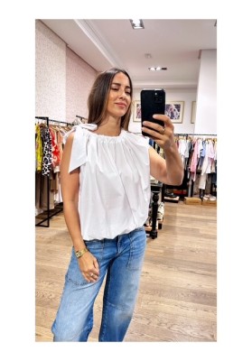 top asimetrico blanco